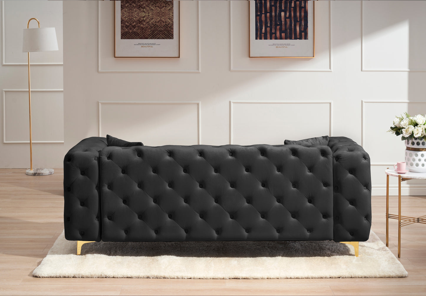 New design comfortable black loveseat with two throw pillows in the same color