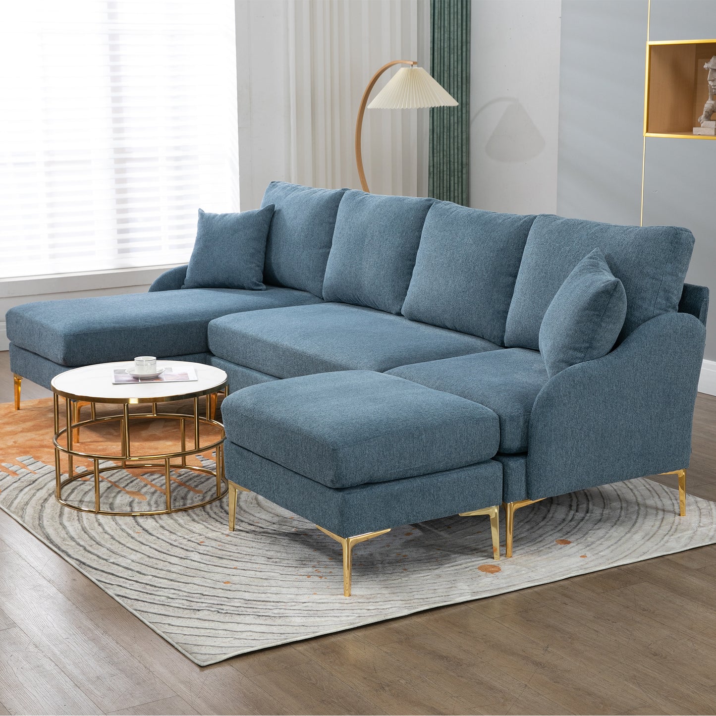 110 Wide Blue Reversible Sectional Sofa with Ottoman and Pillows