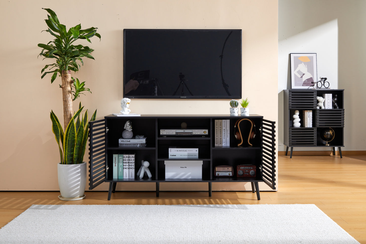 Mid-Century Black TV Stand with Hollow Doors and Storage Shelves for TVs up to 60