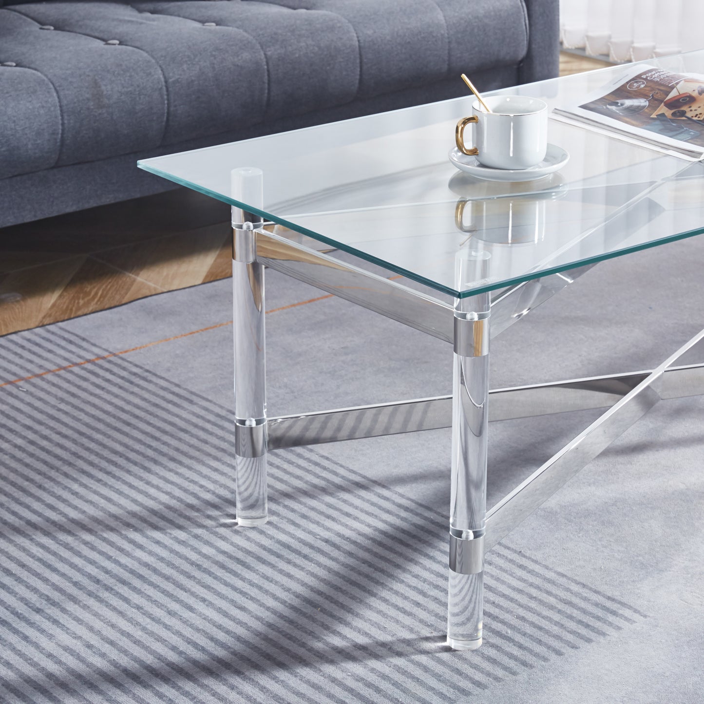 Elegant Silver Stainless Steel Coffee Table With Clear Glass Top and Acrylic Legs