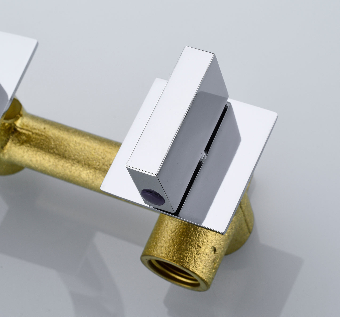 Elegant Brass and Chrome Two Handle Wall Mount Bathroom Faucet