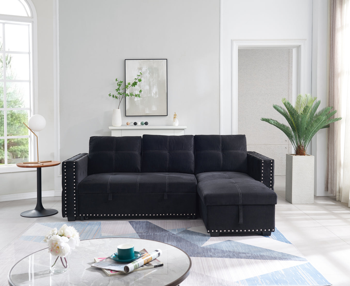 Elegant Black Sectional Sofa with Pull-Out Bed and Reversible Chaise