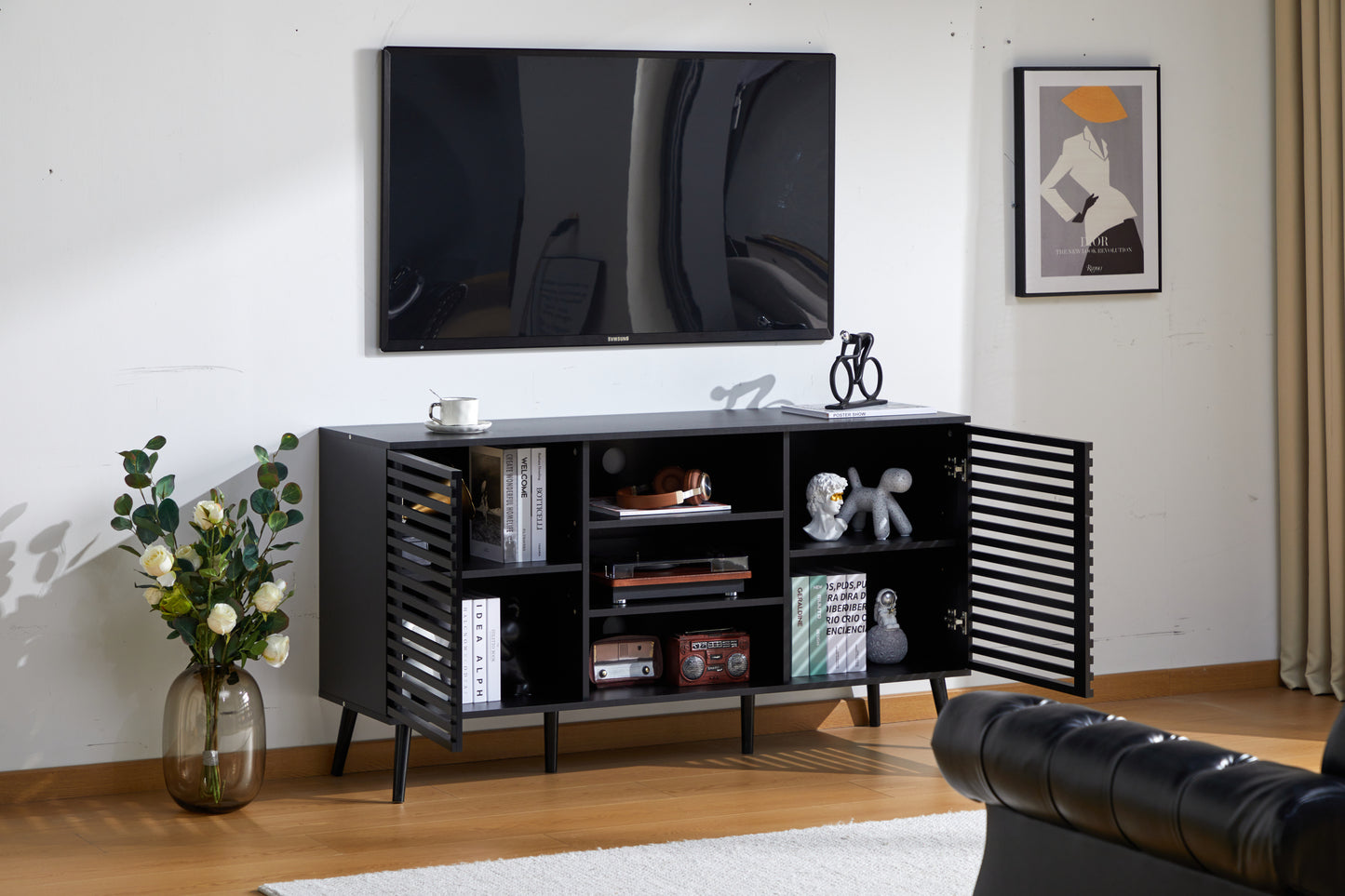 Mid-Century Black TV Stand with Hollow Doors and Storage Shelves for TVs up to 60