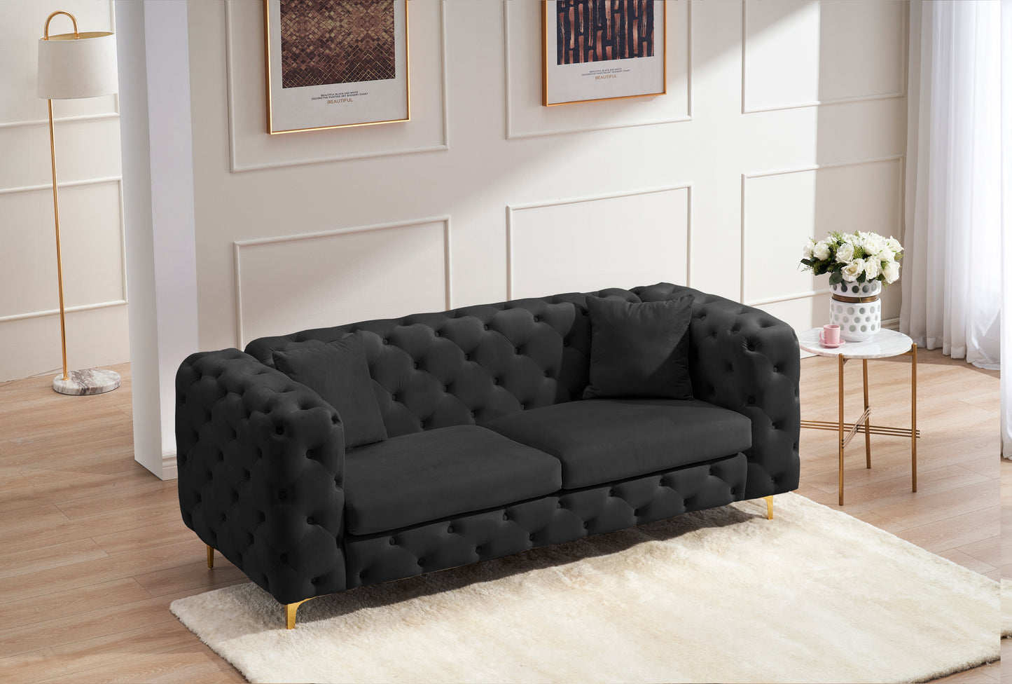 New design comfortable black loveseat with two throw pillows in the same color