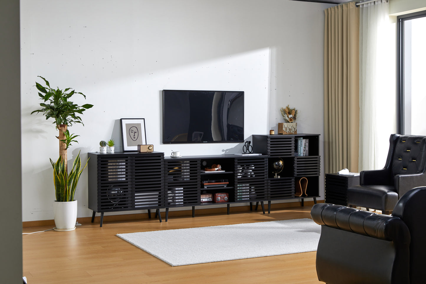 Mid-Century Black TV Stand with Hollow Doors and Storage Shelves for TVs up to 60