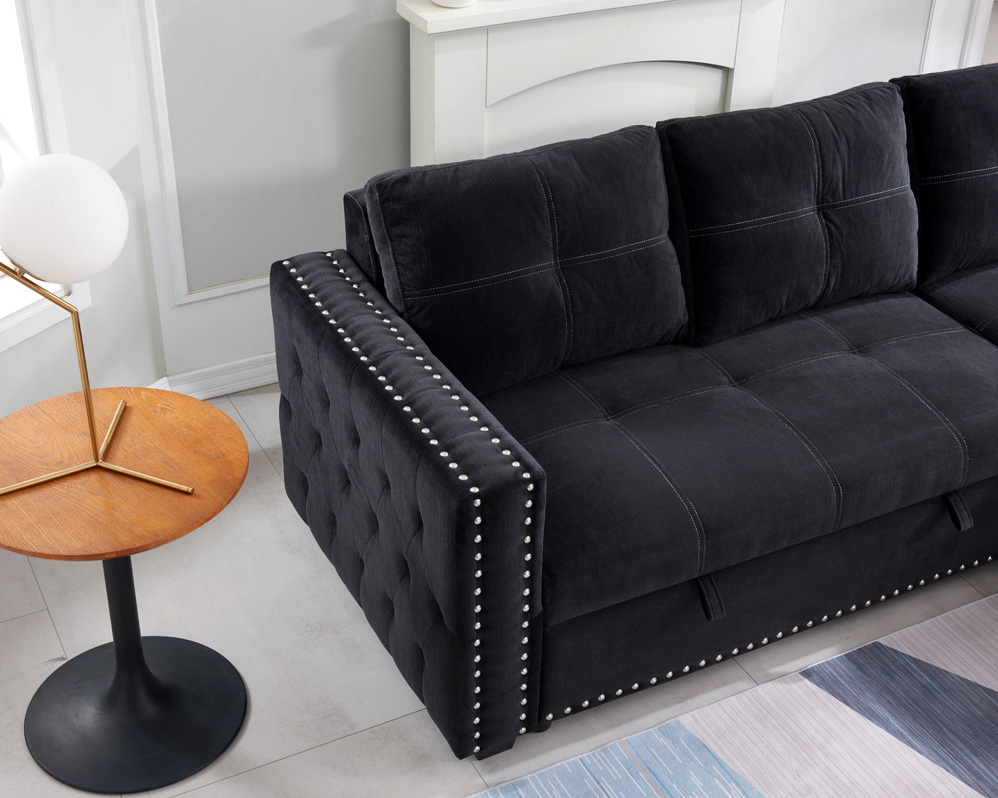 Elegant Black Sectional Sofa with Pull-Out Bed and Reversible Chaise