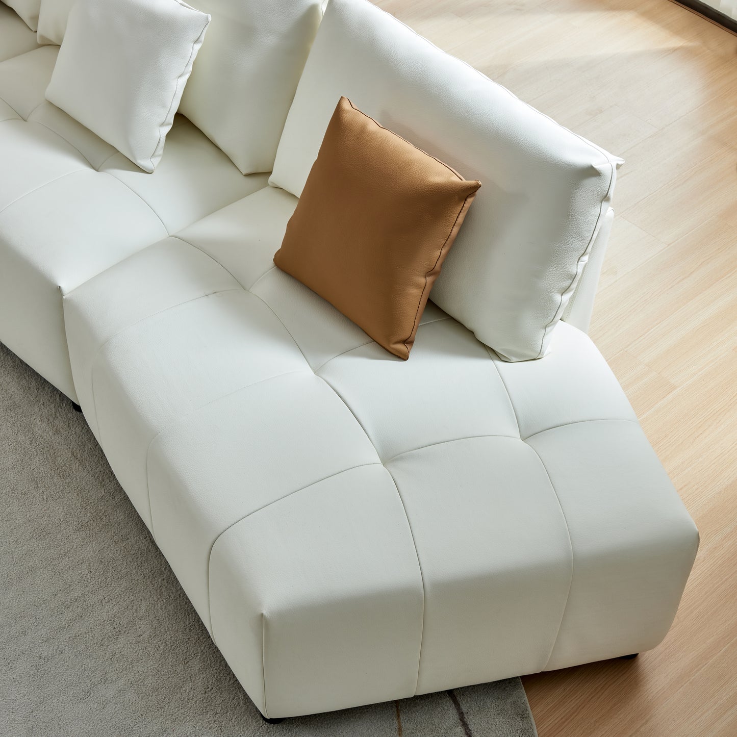 Modern Beige Leather Sectional Sofa with Chaise Lounge and Movable Pillows