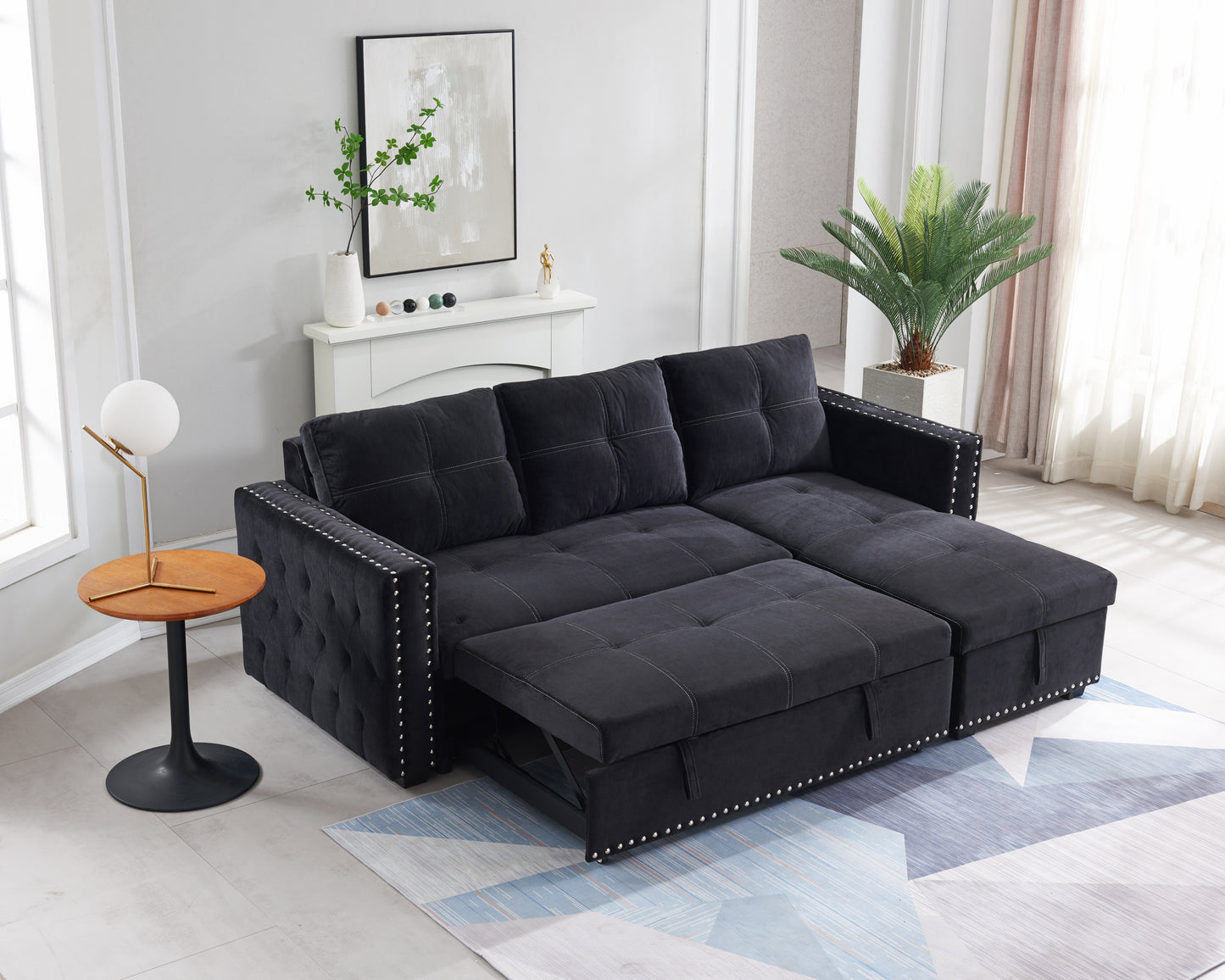 Elegant Black Sectional Sofa with Pull-Out Bed and Reversible Chaise