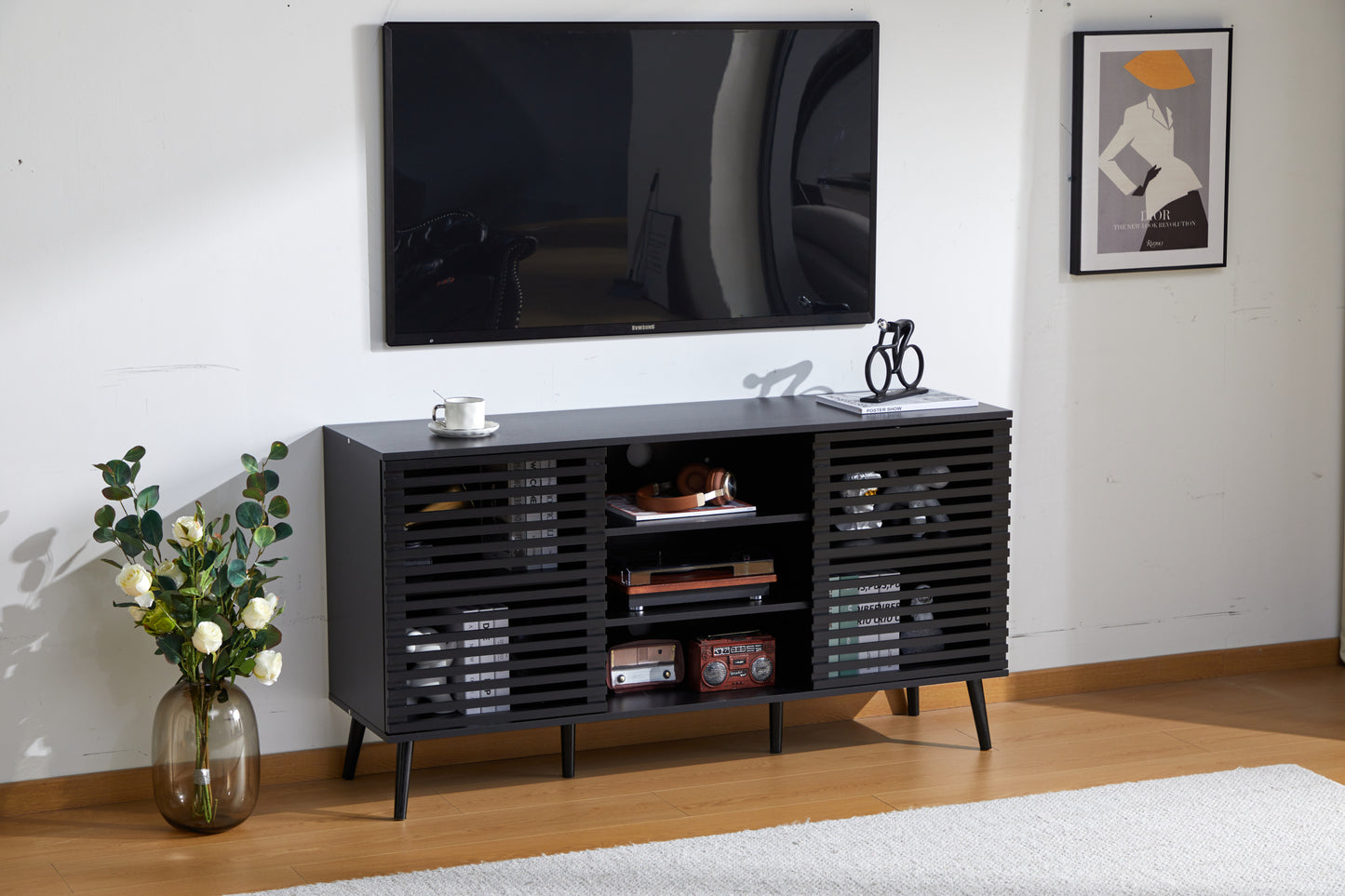 Mid-Century Black TV Stand with Hollow Doors and Storage Shelves for TVs up to 60