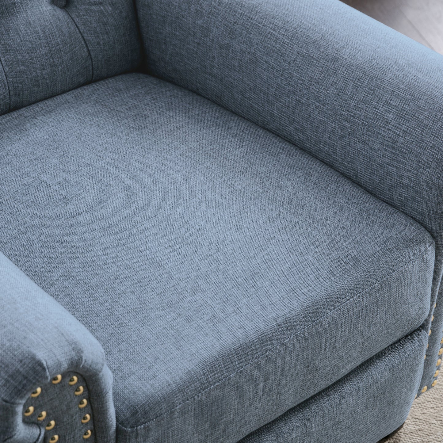 Luxurious Blue Linen Recliner with Pushback Function and Nailhead Trim