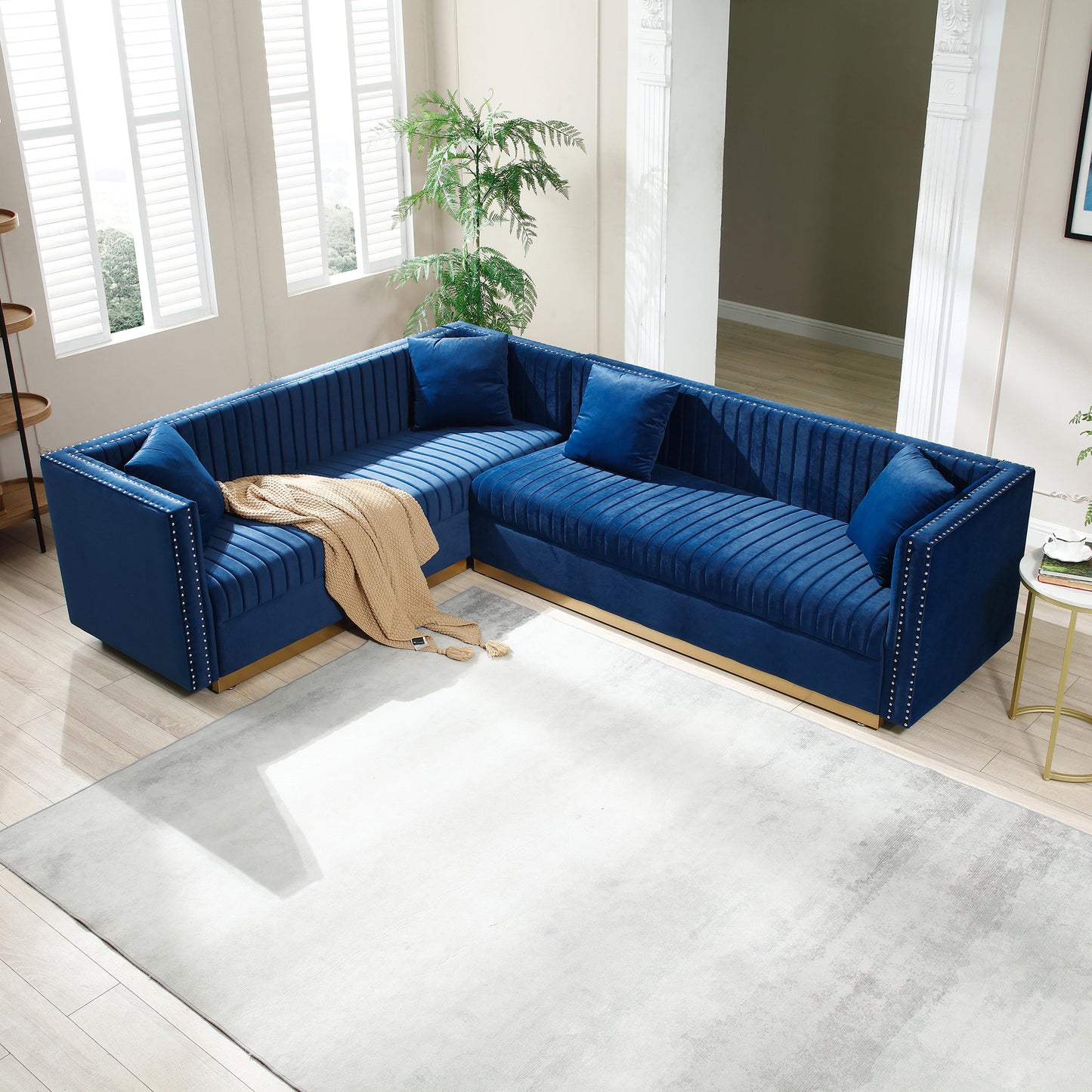 Blue Velvet Sectional Sofa with Channel Tufting and Pillows