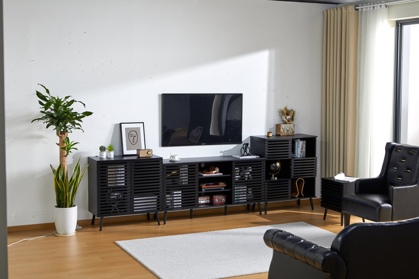 Mid-Century Black TV Stand with Hollow Doors and Storage Shelves for TVs up to 60