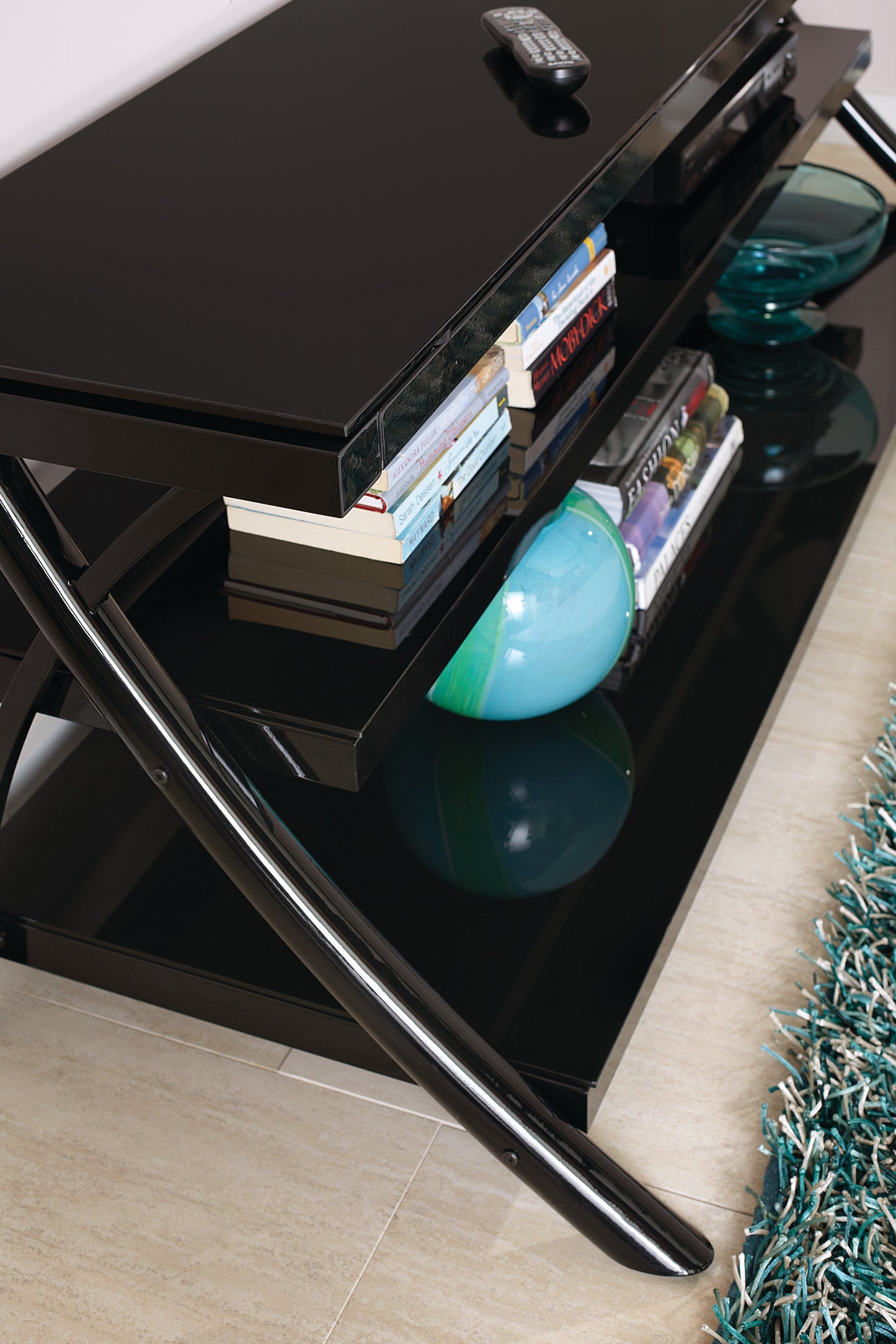 Sleek Modern TV Stand with Smart Cord Management - Black Finish, Smoked Glass Shelves, and Metal Legs