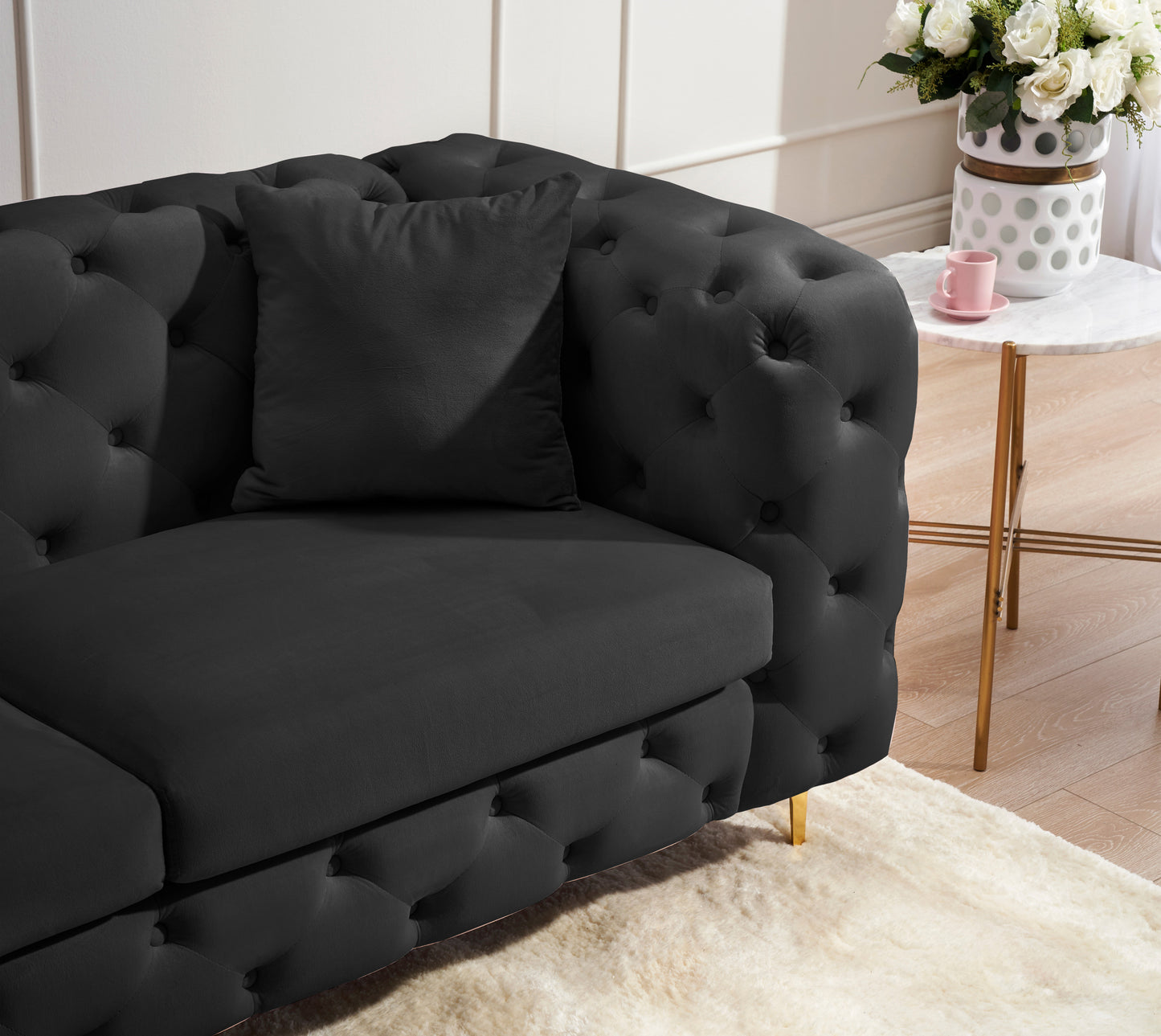 New design comfortable black loveseat with two throw pillows in the same color