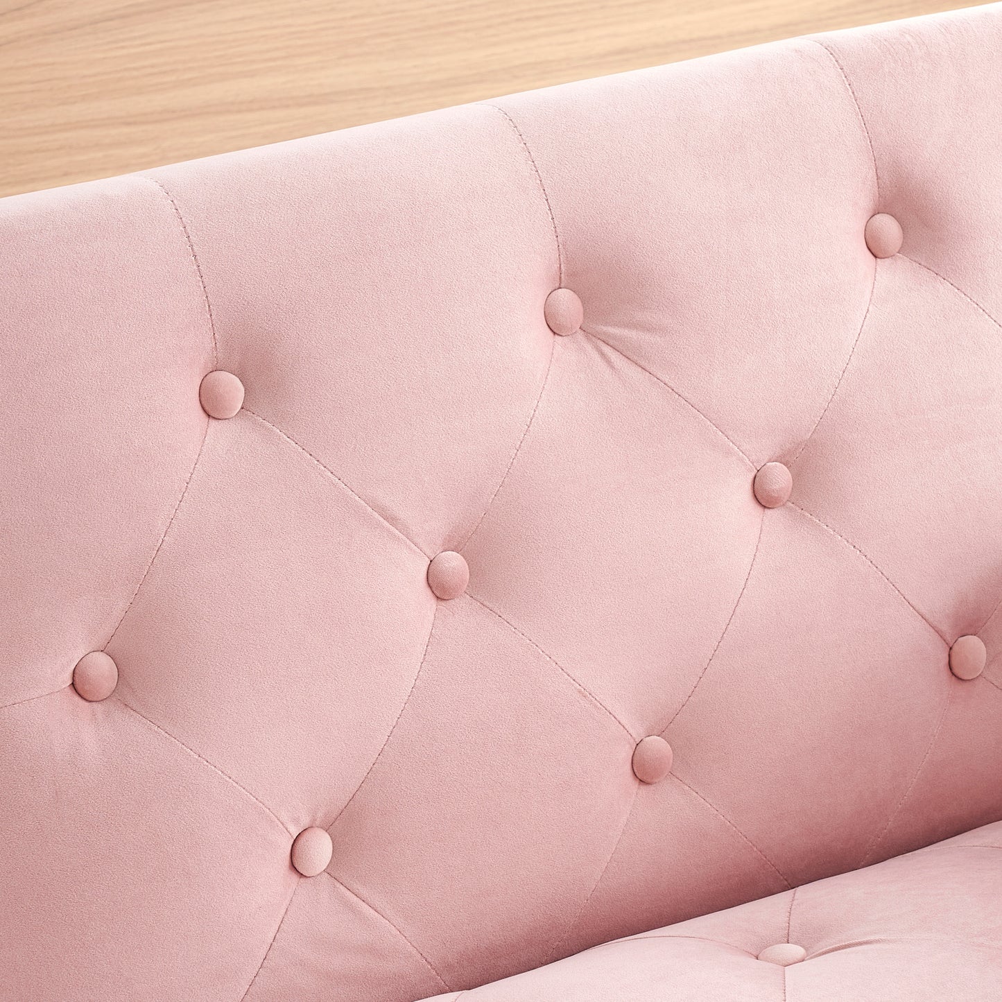 Elegant Pink Velvet Sofa Bed with Nail Head Accents and Throw Pillow