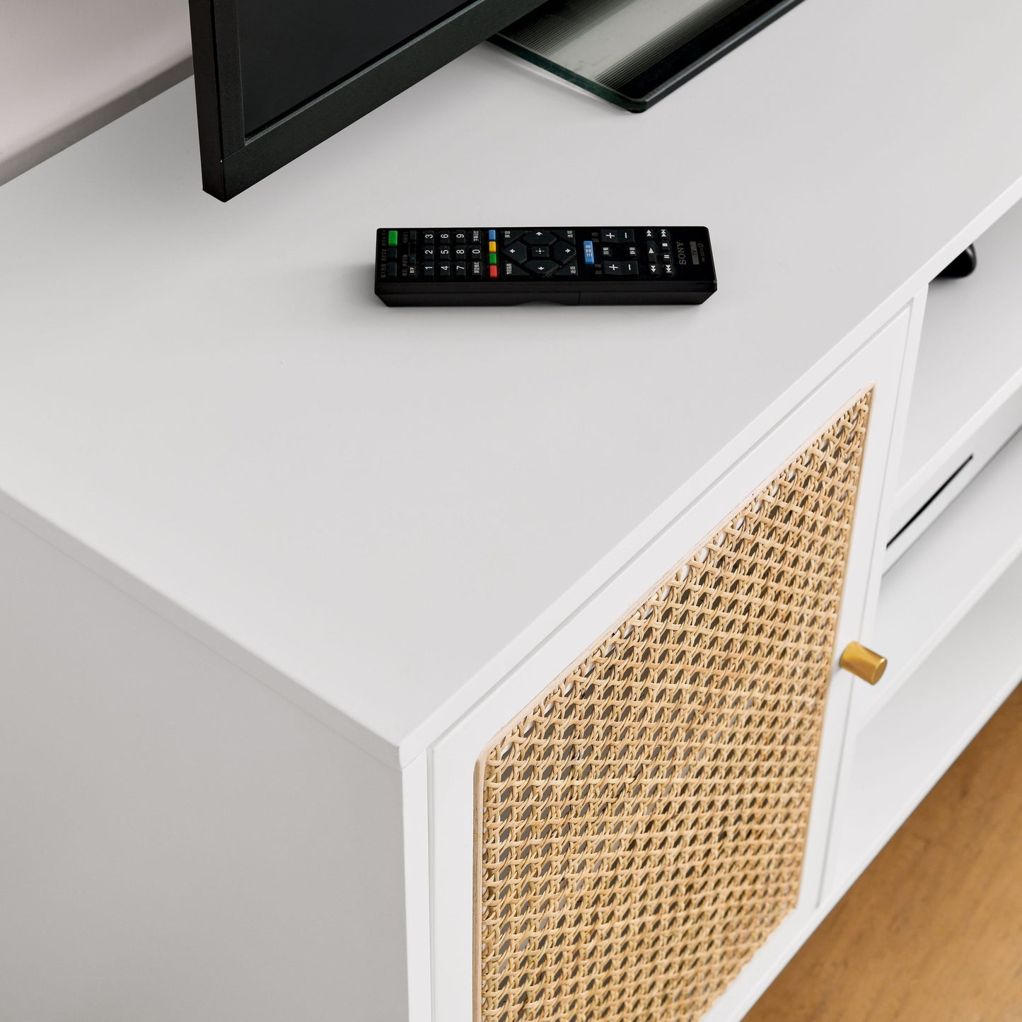 47 Inch White Rattan TV Stand with Adjustable Shelves and Metal Legs