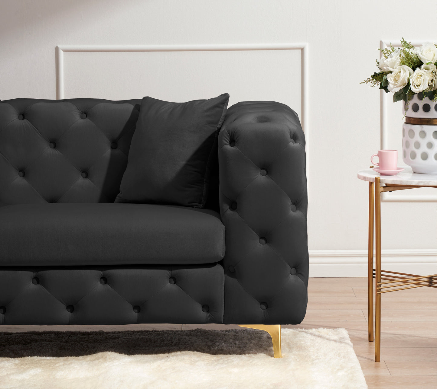 New design comfortable black loveseat with two throw pillows in the same color