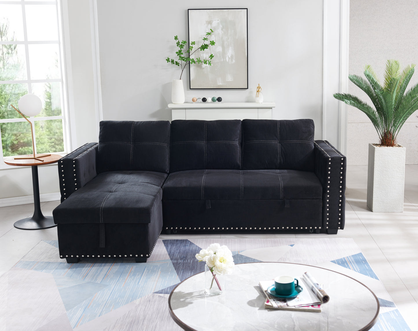 Elegant Black Sectional Sofa with Pull-Out Bed and Reversible Chaise