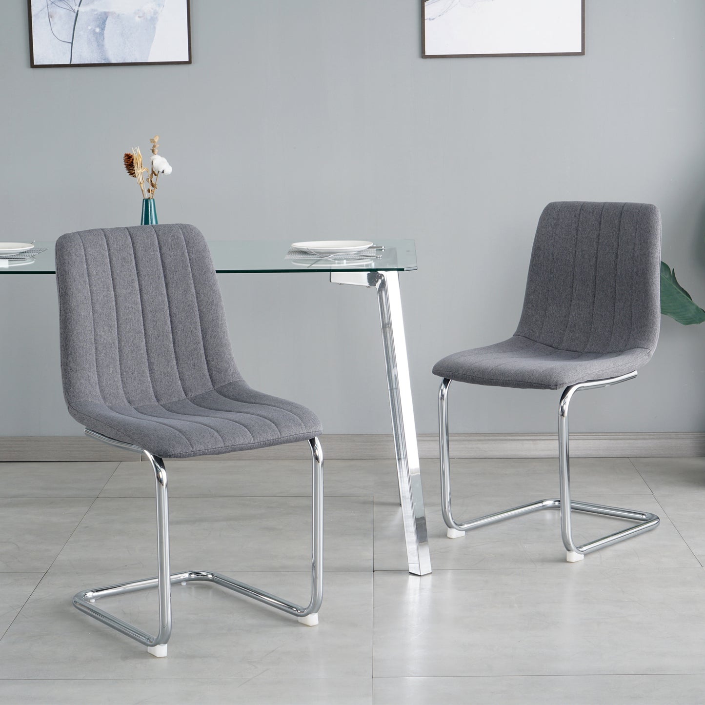 51.1" Table and chair set, one table and four chairs. Clear tempered glass table top, 0.3" thick, silver metal legs. fabric chair with electroplated metal legs.