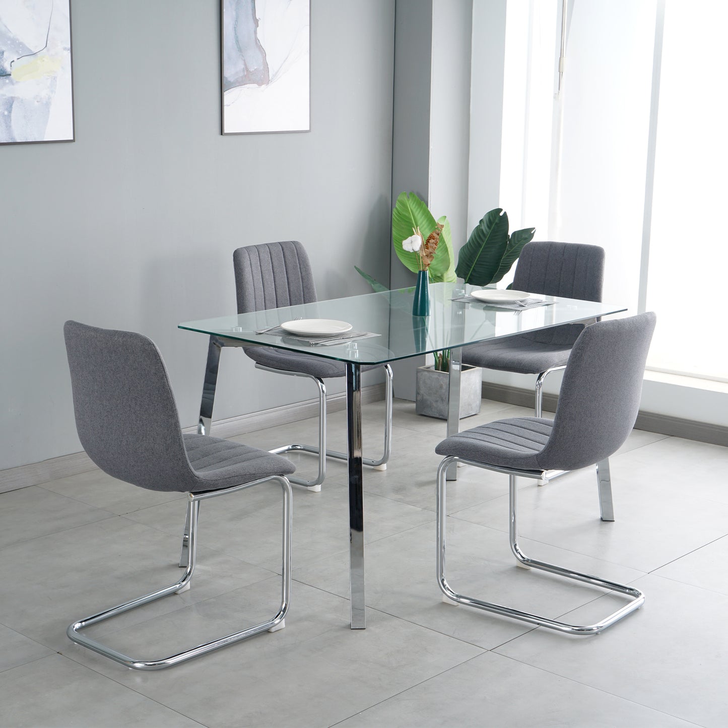 51.1" Table and chair set, one table and four chairs. Clear tempered glass table top, 0.3" thick, silver metal legs. fabric chair with electroplated metal legs.