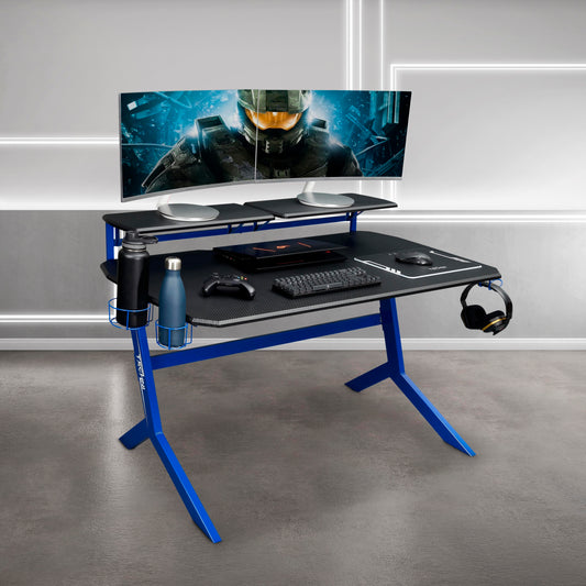 Techni Sport Blue Stryker Gaming Desk with Carbon Fiber Texture in Striking Blue