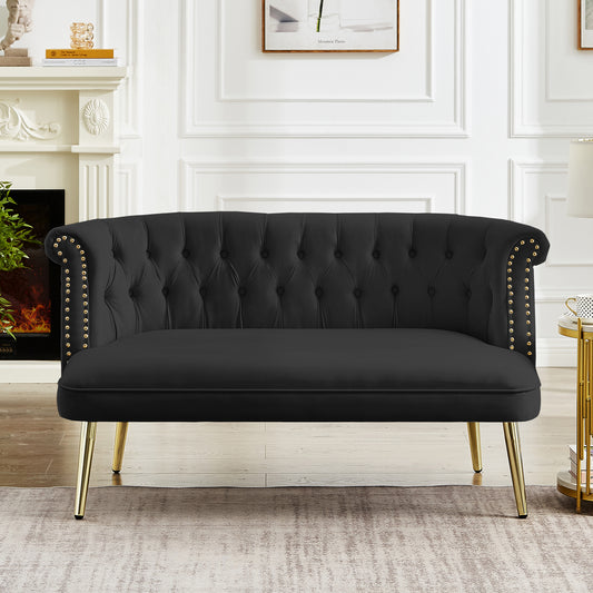 black sofa with nailhead arms