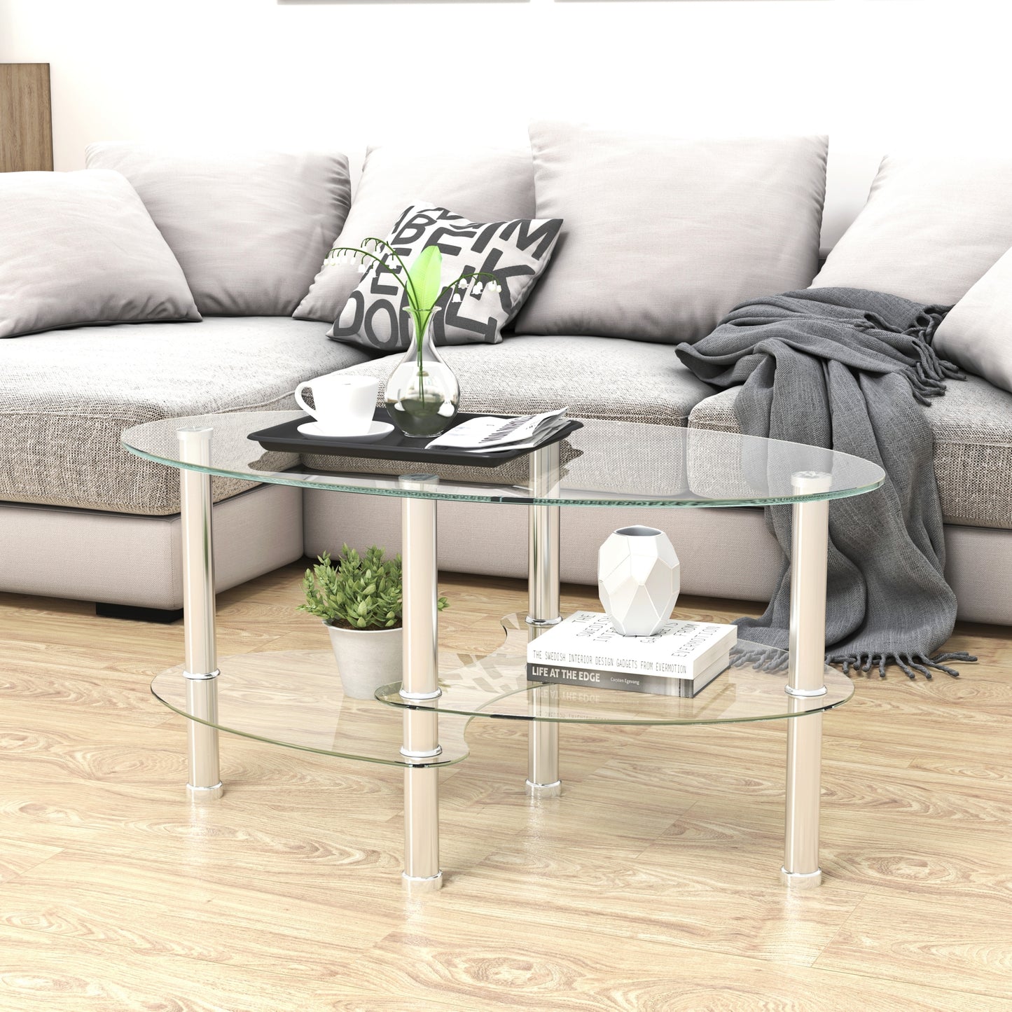 Elegant Oval Glass Coffee Table with Stainless Steel Legs for Stylish Living Spaces